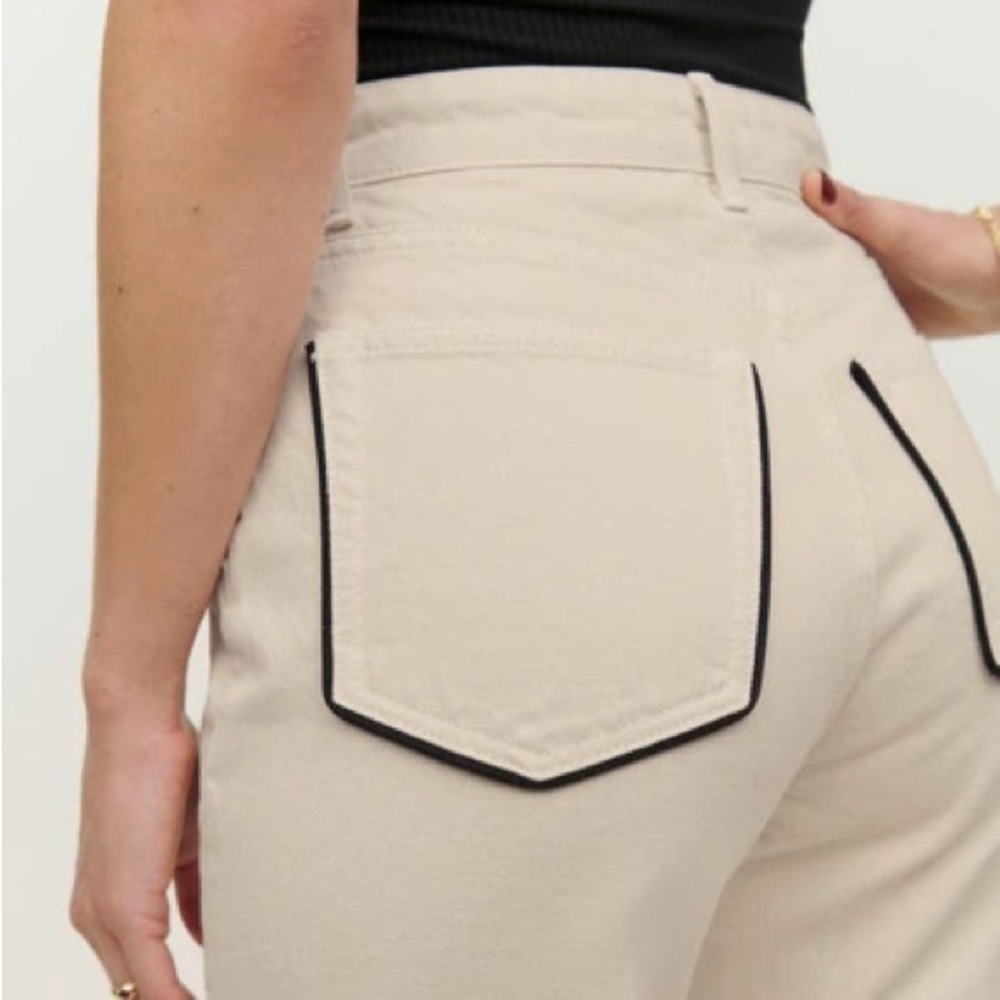 Brand new Reformation Cynthia high rise Jean in color Almond with Piping.